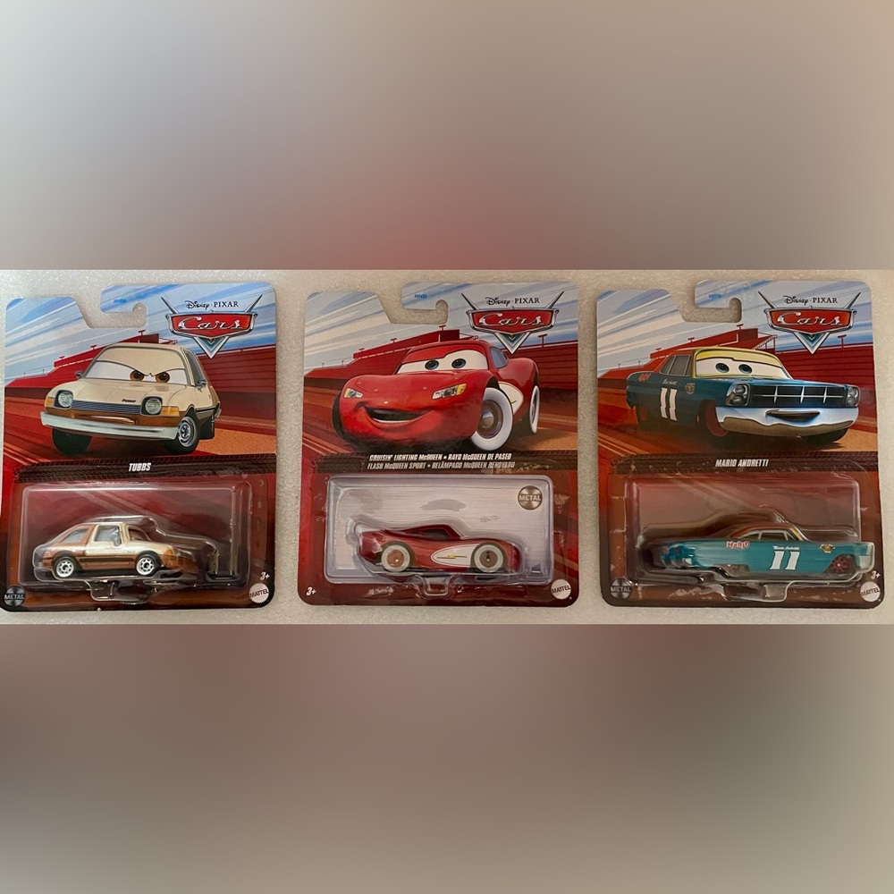 TUBBS,  MARIO ANDRETTI, CRUISIN’ LIGHTNING McQUEEN error card reads “Lighting”
